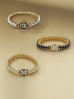 TENNISARMBAND goudkleurig met Swarovski pareltjes of kristallen